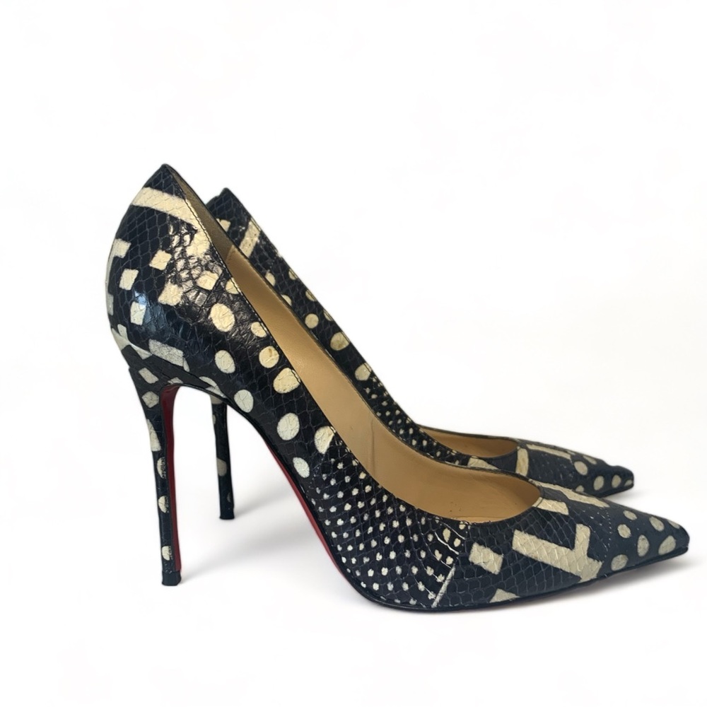 Impossible to find!  Authentic Christian Louboutin snakeskin printed pump!